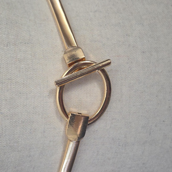 Gold Stretchy Belt With Circular Buckle PLEASE SEE PICTURES FOR IMPERFECTION. - Picture 3 of 6